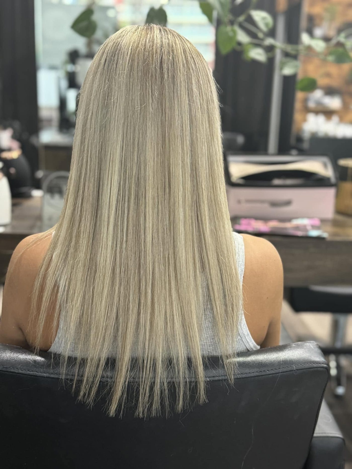 Sleek blonde finish at Hair Pacific